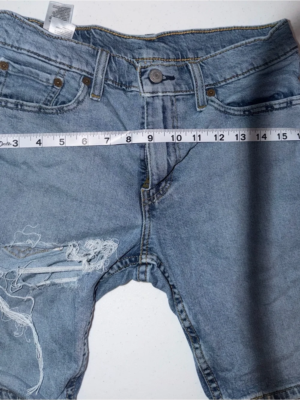 Levi's Light Blue Distressed Denim Shorts